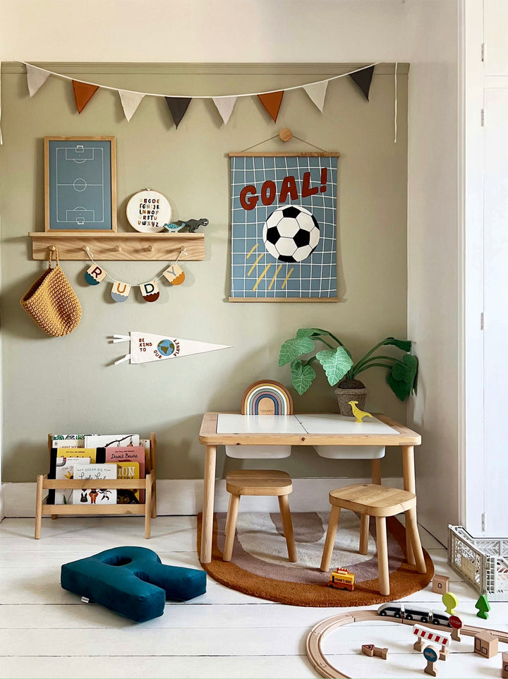 Football in pitch in blue / Framed Print