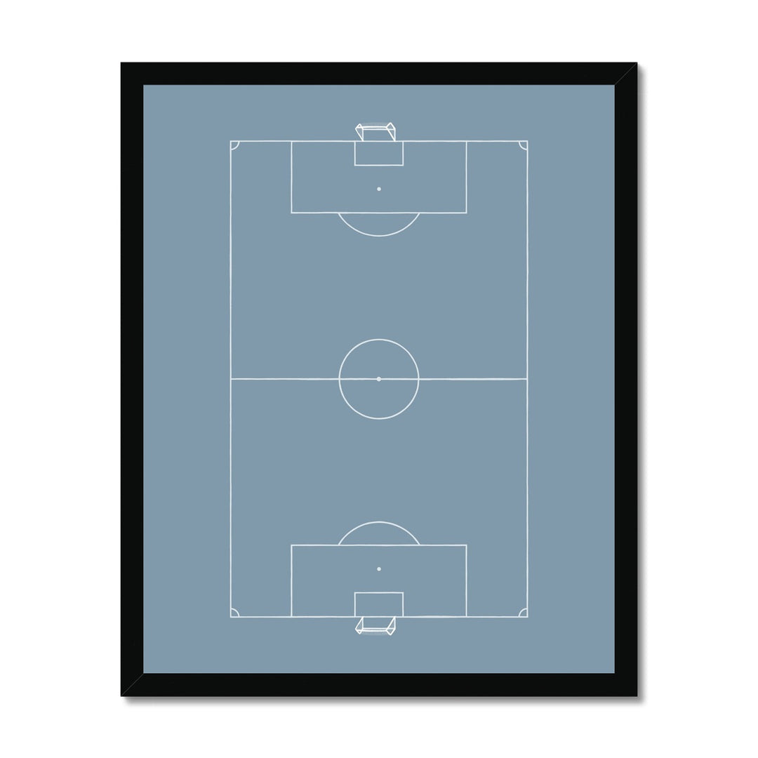 Football in pitch in blue / Framed Print